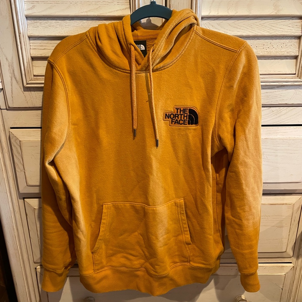 mustard north face sweatshirt, lightly used